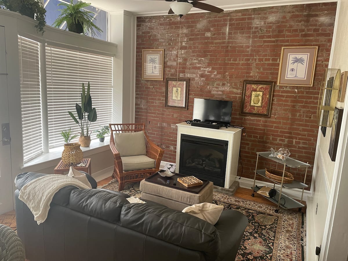 Exposed brick living room inside the 1896 Store Front